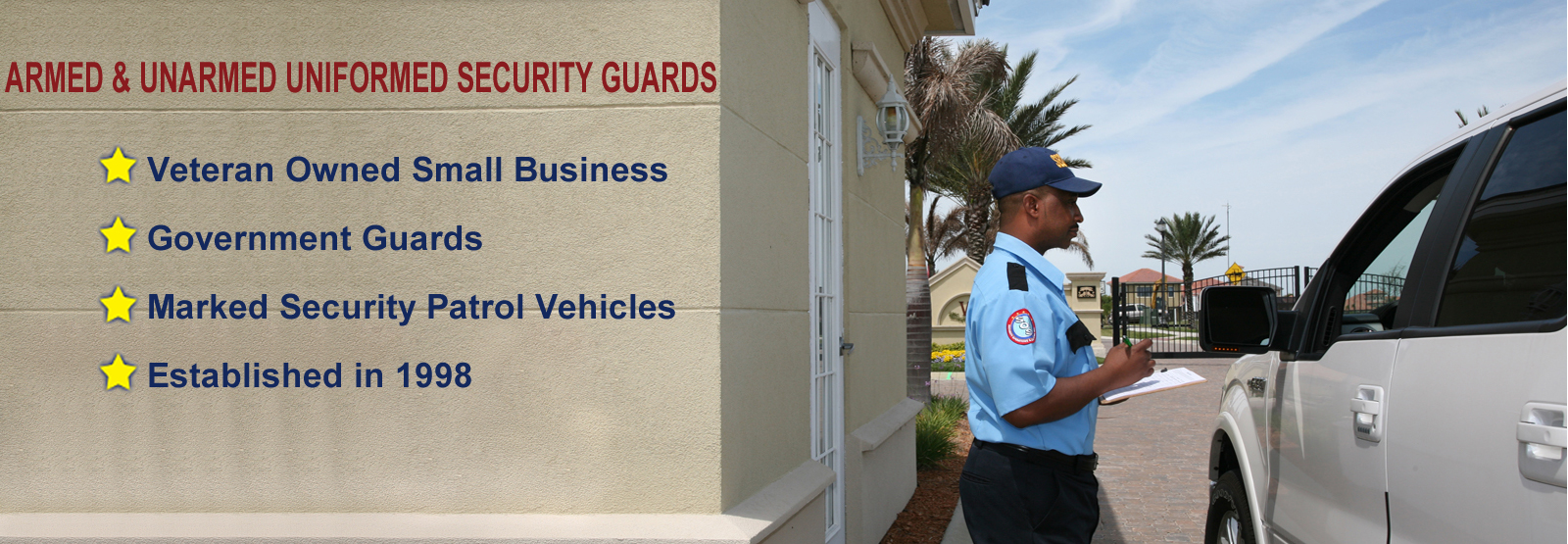 Guard checking car at gate.